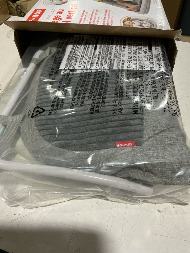 Condition photo showing New/Like New for skip hop baby ergonomic activity floor seat for upright sitting lightweight and travel-friendly silver lining cloud grey age 0+