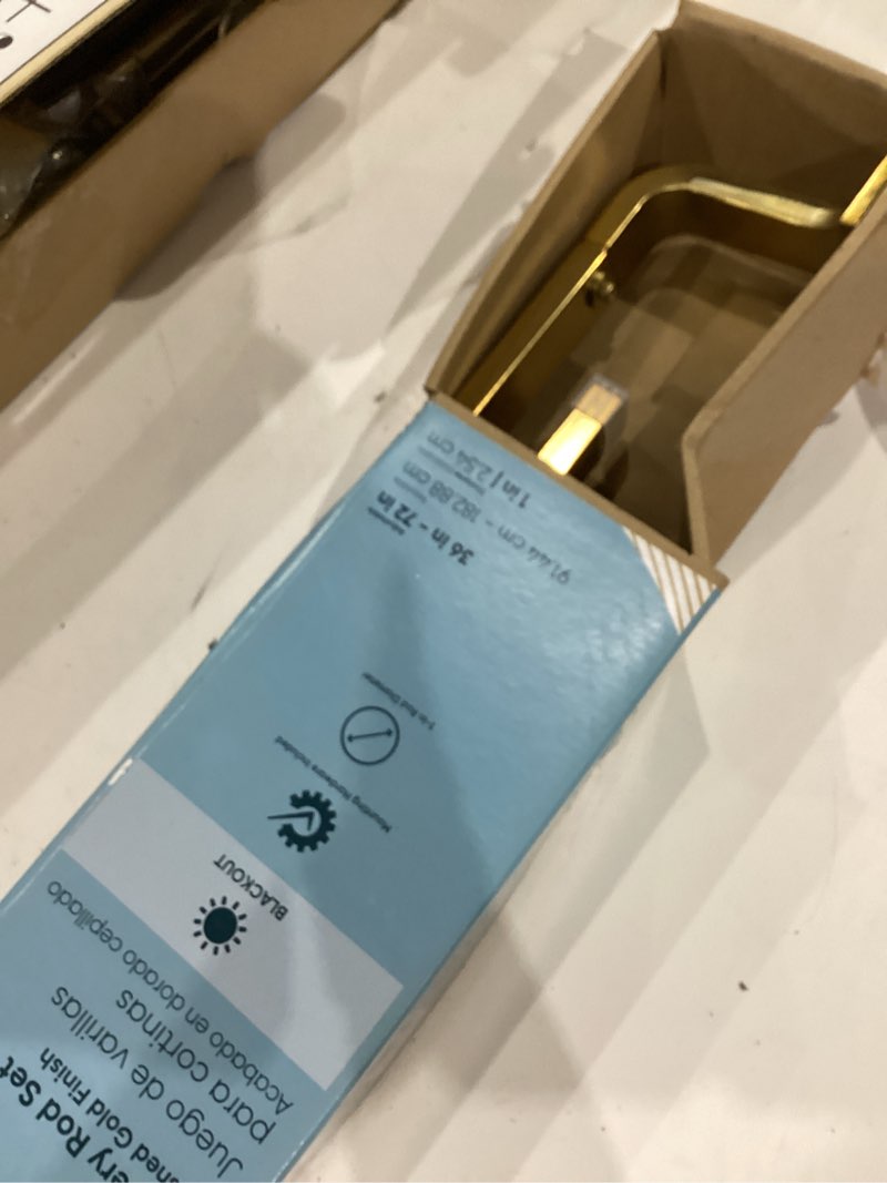 Condition photo showing As Is for origin 21 36-in to 72-in brushed gold iron corner curtain rod with finials