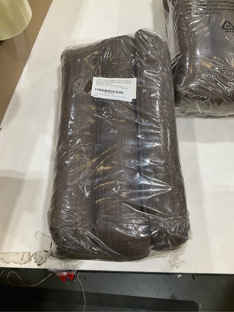 Condition photo showing New/Like New for home district sliding door draft stopper - glass door draft blocker, patio under door draft stopper, door air blocker draft dodger - approx. 71" long - brown tweed