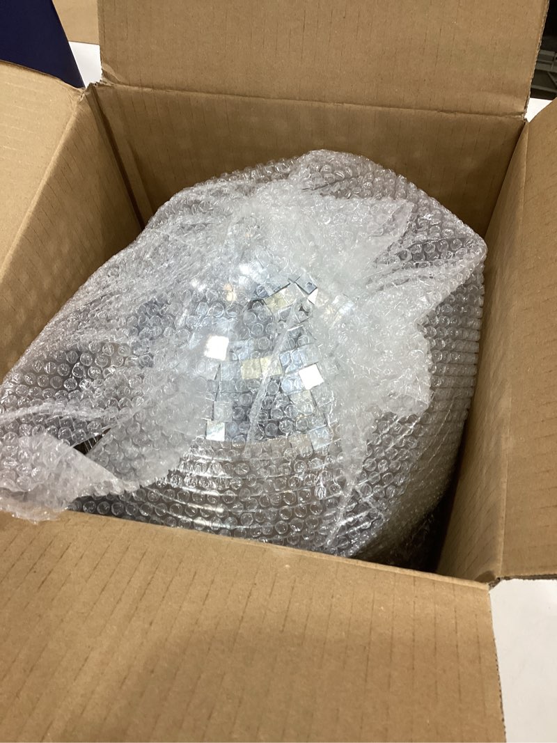 Condition photo showing item condition for 10-Inch Silver Mirror Disco Ball - The Ultimate Party Decoration for Wedding - Transform Your Event with Dazzling Light Reflections - Ideal for Dance Parties and Special Occasions - Silver