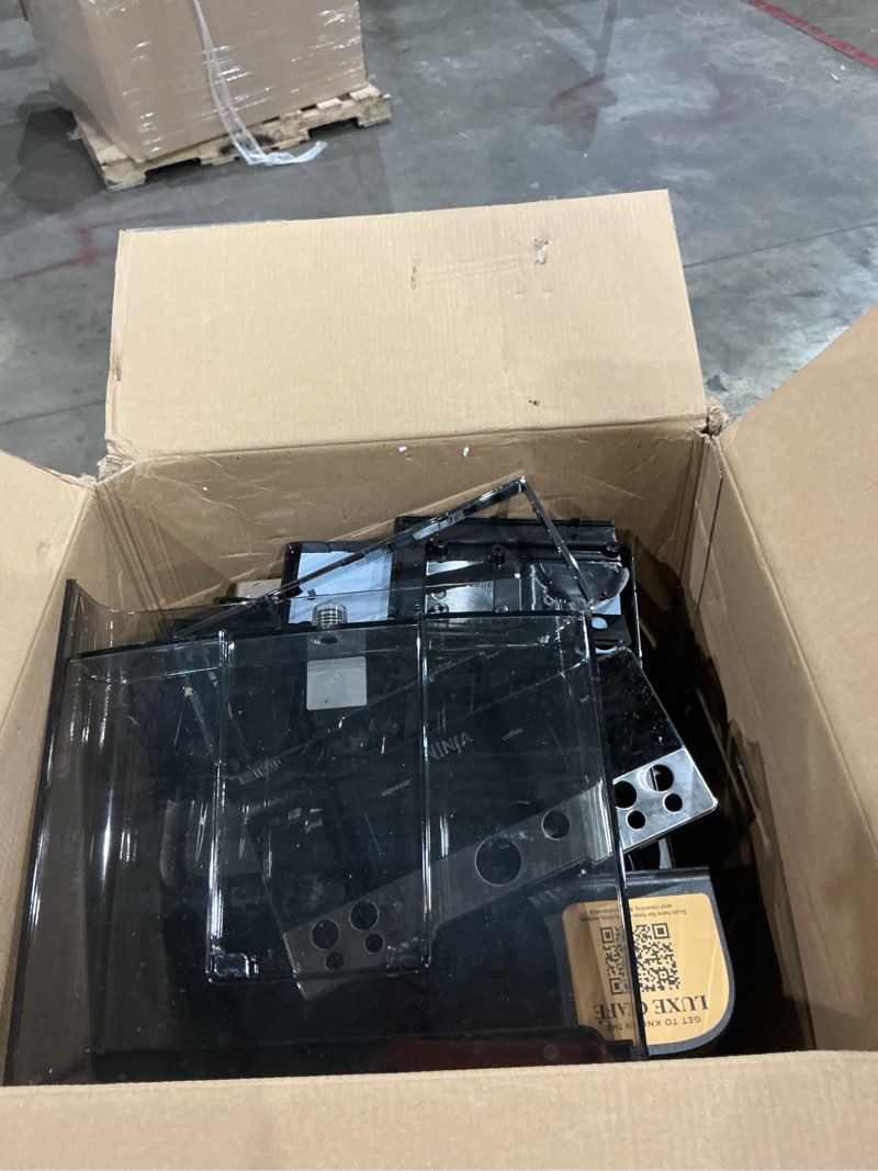 Condition photo showing As Is for ninja luxe café 3-in-1 espresso, drip coffee and cold brew machine | integrated coffee grinder, milk frother, assisted tamper & built-in espresso accessory storage | stainless steel | es601 luxe cafe stainless steel