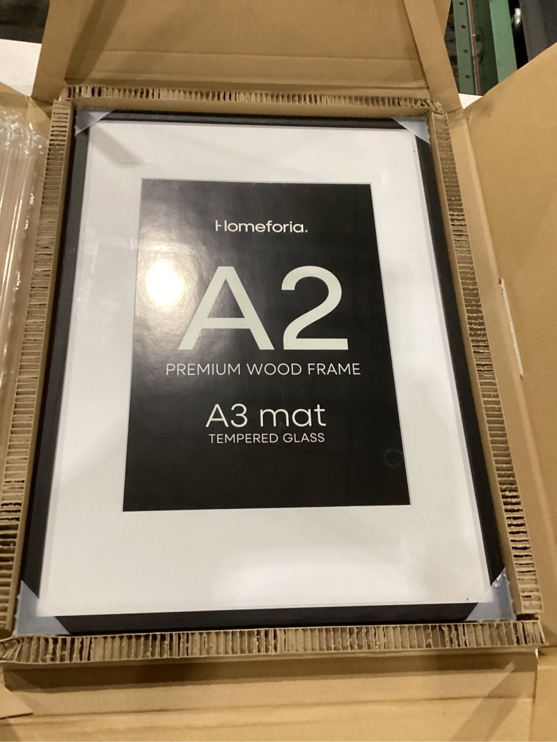 Condition photo showing New/Like New for Homeforia Black Wood A1 Frame, High End Oak 23.4 x 33.1 Black Wooden Poster Frames Matted to 16.5 by 23.4 inches Photo, A1 Size Large Wood Picture Frame with Mat A2, Tempered Glass, Wall Kit, Set of 1