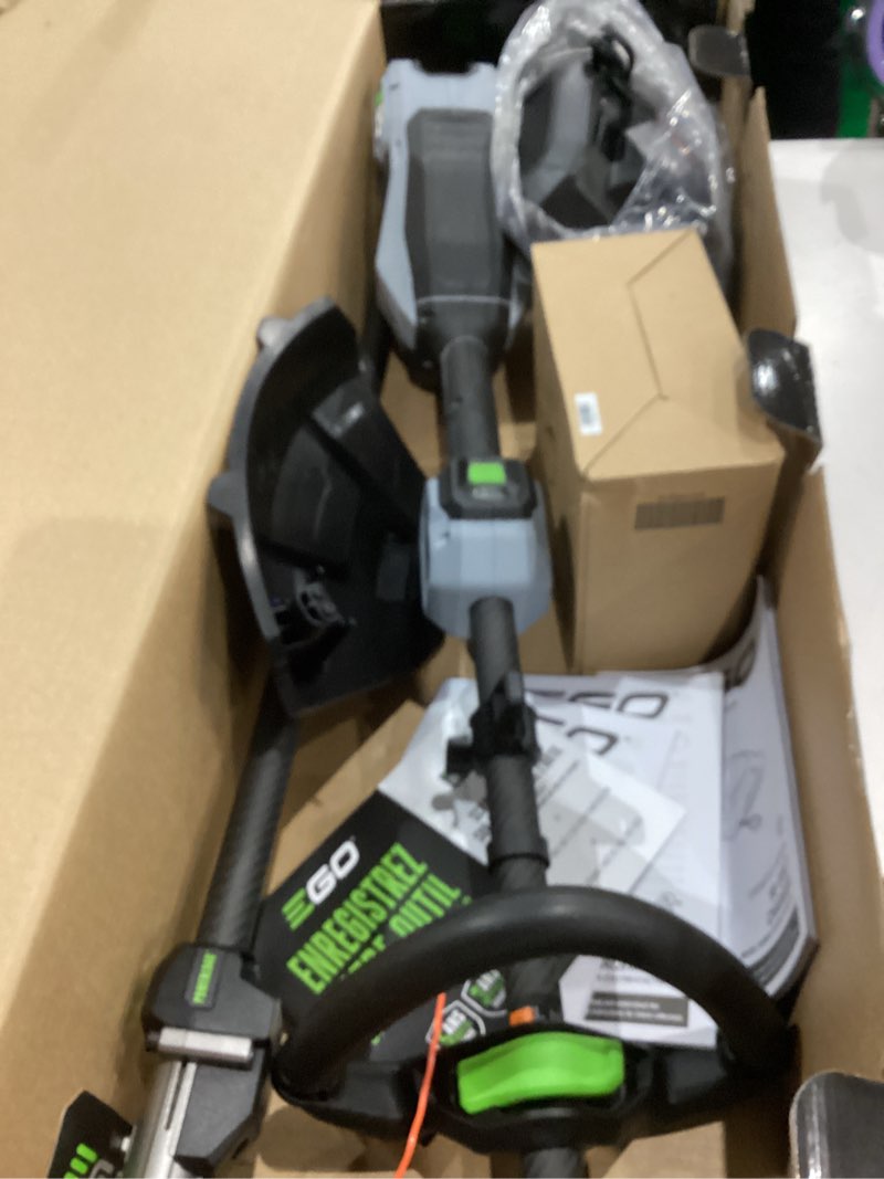 Condition photo showing As Is for ego power+ multi-head system with line iq, powerload 56-volt 17-in straight shaft attachment capable battery string trimmer 5 ah (battery included) (charger included)