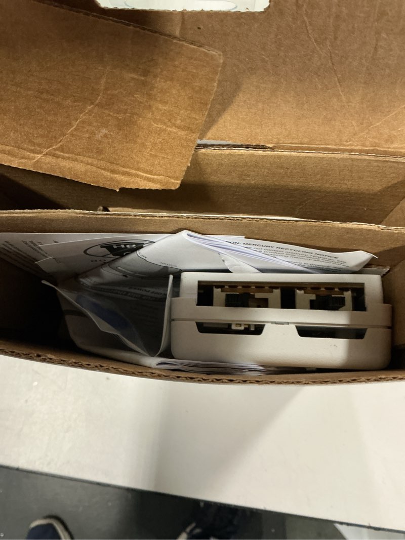 Condition photo showing As Is for Honeywell Home Non Programmable Thermostat for Heat and Cool Systems  White  New