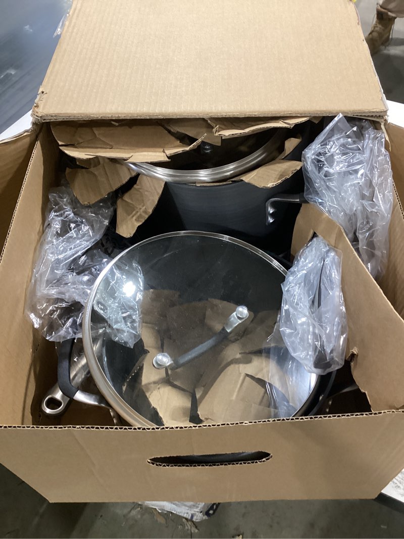 Condition photo showing As Is for Calphalon 10-Piece Non-Stick Kitchen Cookware Set Black Pots & Pans with Stay-Cool Stainless Steel Handles Hard-Anodized Aluminum for Even Heating 10-Piece Set