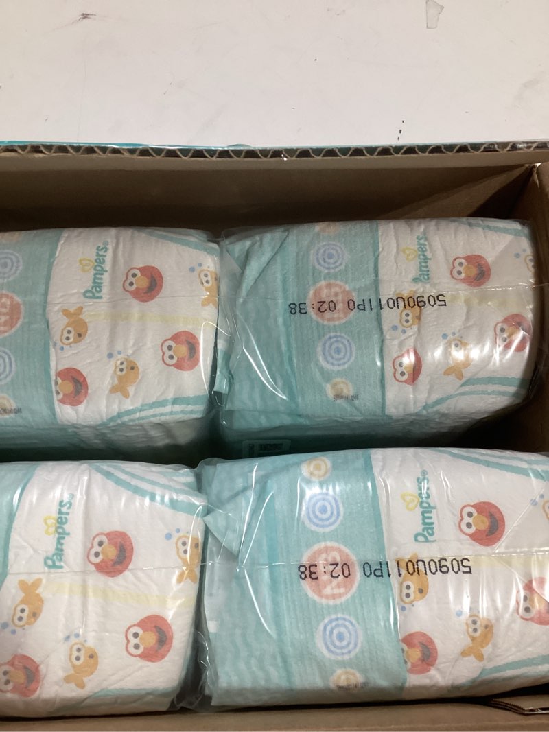 Condition photo showing New/Like New for Pampers Diapers - Baby Dry - Size 0, 104 Count, Absorbent Disposable Newbort Diaper (Packaging May Vary) Newborn 104