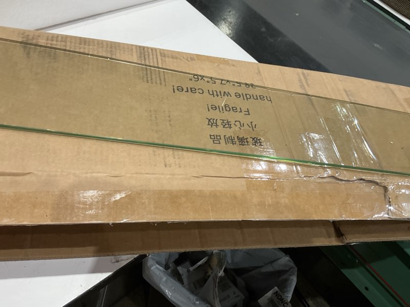 Condition photo showing Good Condition for gaspro 38.5 x 7.5 inch glass wind guard for rectangular fire pit table, thick and sturdy tempered glass panel with hard aluminum corner bracket & rubber feet, easy to assemble 38.5 x 7.5 x 6 inch