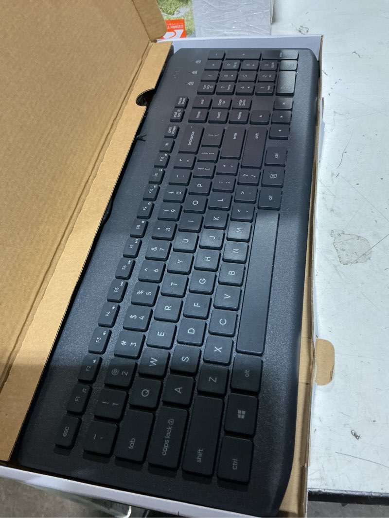 Condition photo showing New/Like New for onn. usb computer keyboard with 104-keys, 5 ft cable, windows and mac compatible, gray