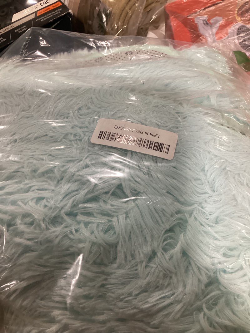 Condition photo showing Good Condition for olanly 2x3 machine washable small bedside rug, soft fluffy shaggy entryway throw rugs for bedroom, living room, indoor floor carpet for kids girls and boys, home decor aesthetic, light blue 2x3 ft light blue