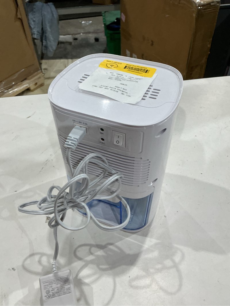 Condition photo showing As Is for pure enrichment puredry mini dehumidifier 0.53 pt. dehumidifier (for rooms 0 - 150 sq. ft) for