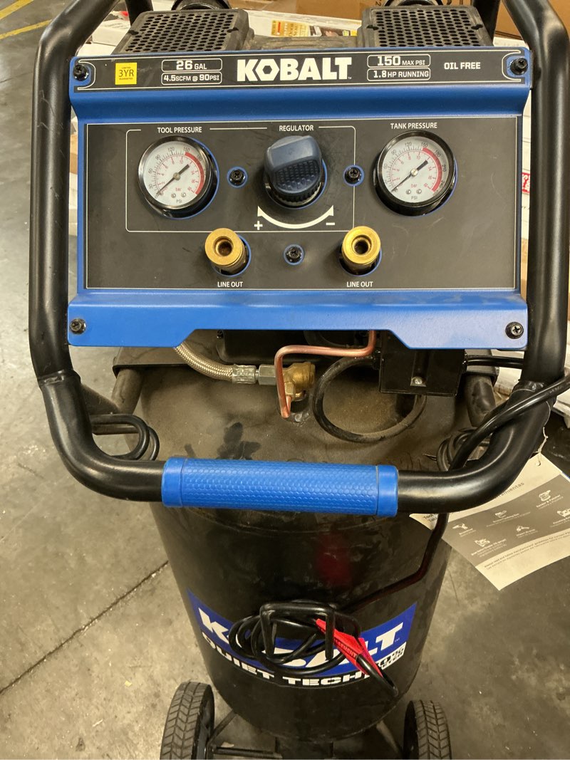 Condition photo showing As Is for kobalt quiet tech 26-gallon portable electric 150 psi vertical air compressor