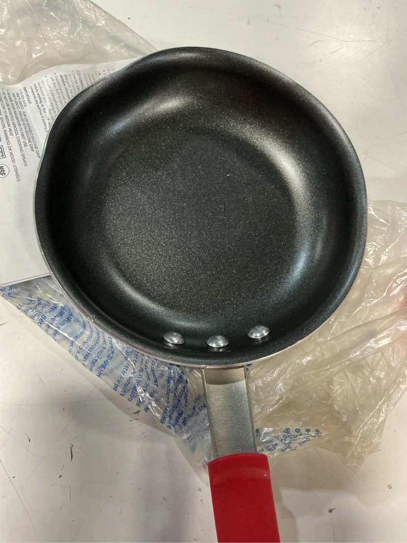 Condition photo showing As Is for tramontina professional 8-inch non stick small frying pan, heavy-gauge aluminum skillet with reinforced nonstick coating, red handle, dishwasher and oven safe nonstick (red handle) 8 inch