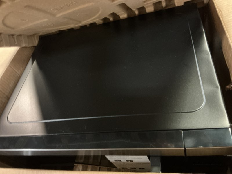 Condition photo showing As Is for hamilton beach 1.6 cu ft sensor cook countertop microwave oven in stainless steel, new