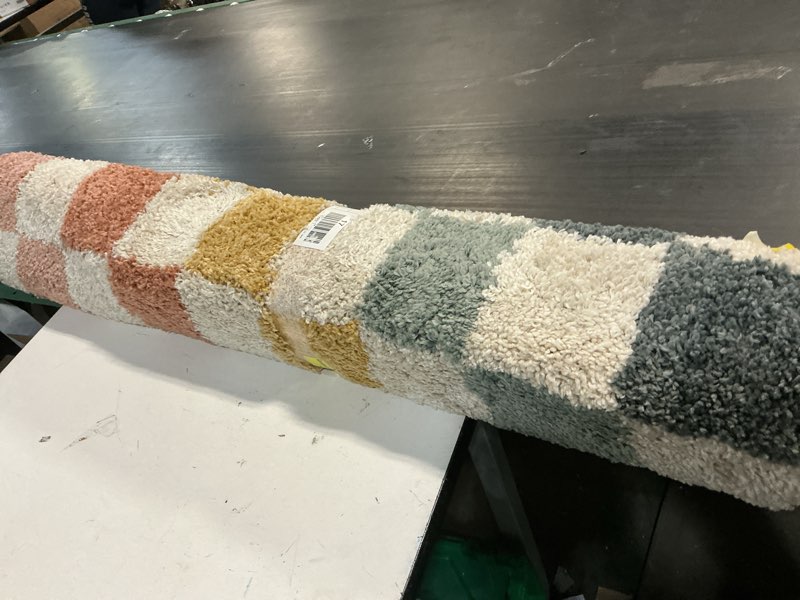 Condition photo showing As Is for mainstays rainbow checker indoor rug, 4' x 5'5"