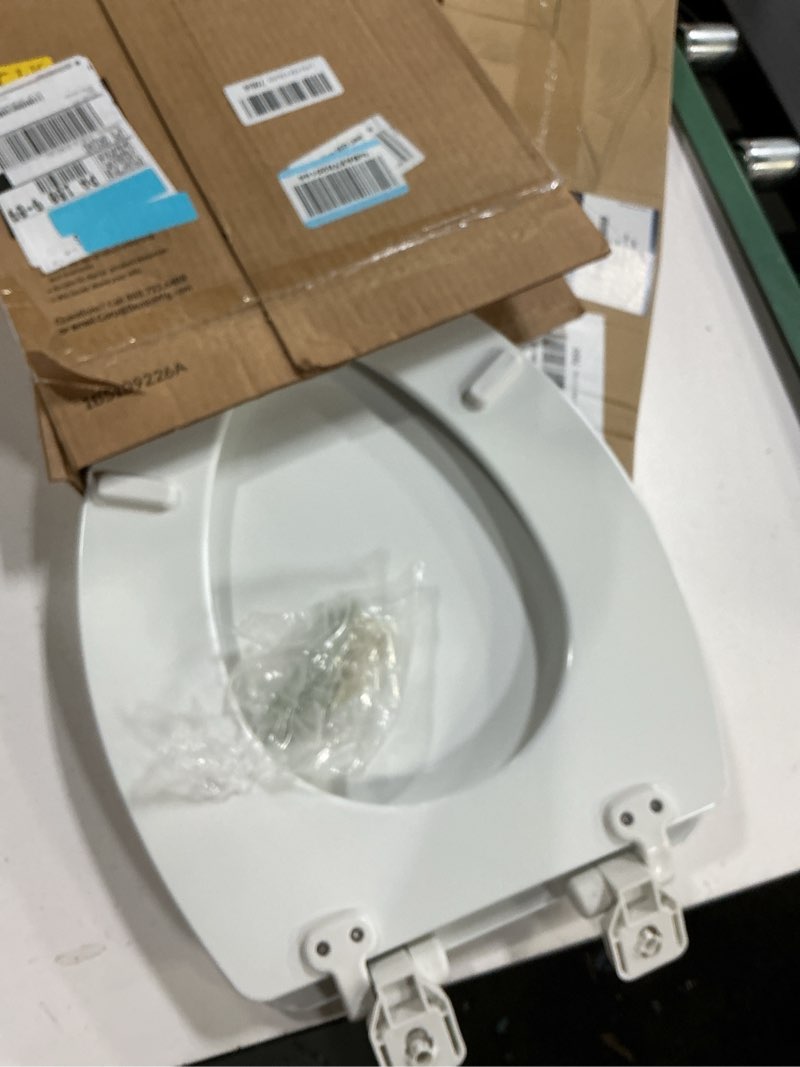 Condition photo showing Good Condition for mayfair linden slow close toilet seat, non slip heavy duty wood, easy install, elongated, white elongated traditional hinge