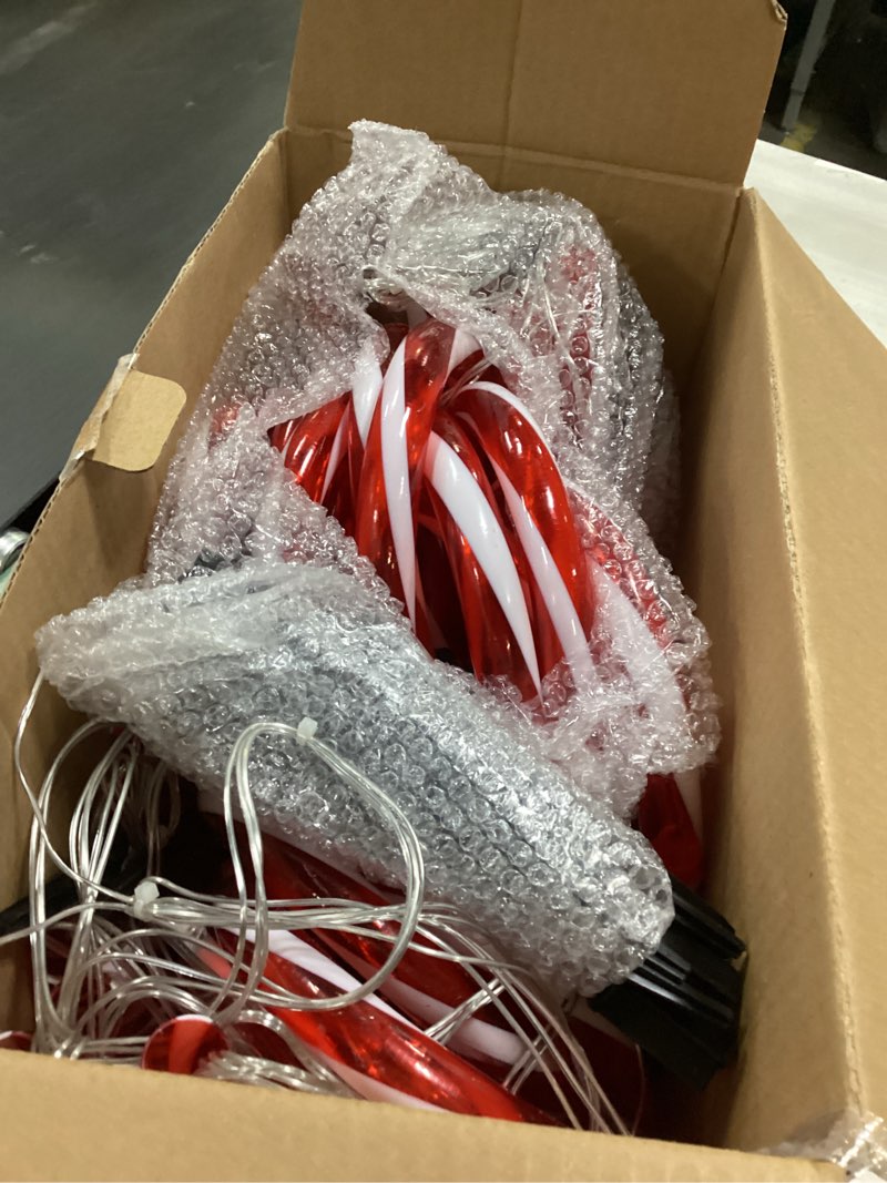 Condition photo showing As Is for 22" Candy Cane Lights Outdoor Pathway 2PK 12 PCS 8 Modes Solar Candy Cane Lights Total 15FT Christmas Pathway Light Outdoor for Xmas Yard Garden Walkway Driveway Red