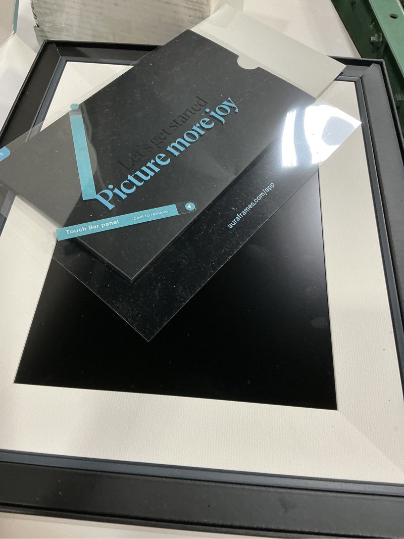 Condition photo showing As Is for aspen 12" | aura's most versatile hd digital picture frame