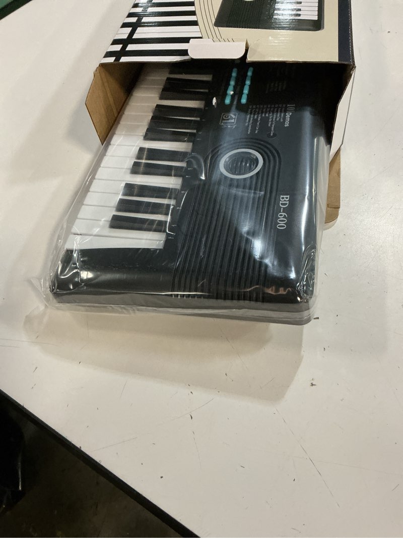 Condition photo showing Good Condition for 61 key keyboard piano,portable electronic digital piano,built in dual speakers,external microphone,power plug,rich teaching content,multi-functional electronic piano suitable for beginners kkek5 black
