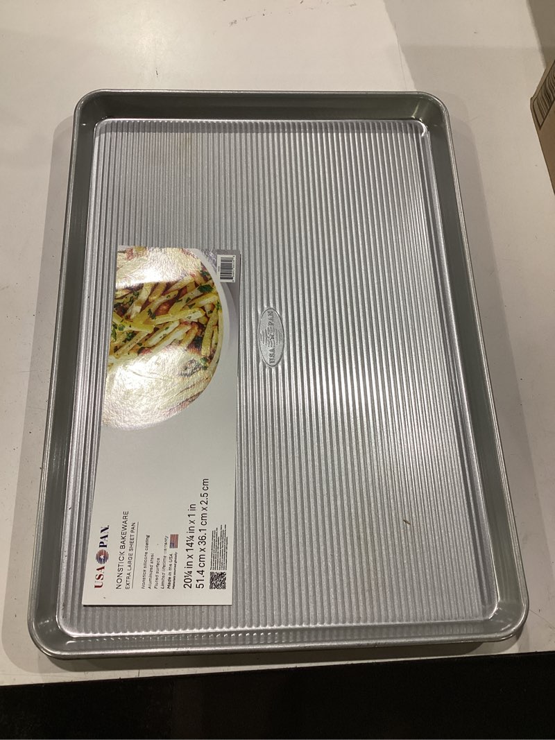Condition photo showing New/Like New for usa pan bakeware nonstick extra large baking sheet pan, aluminized steel set of 1 xl sheet pan