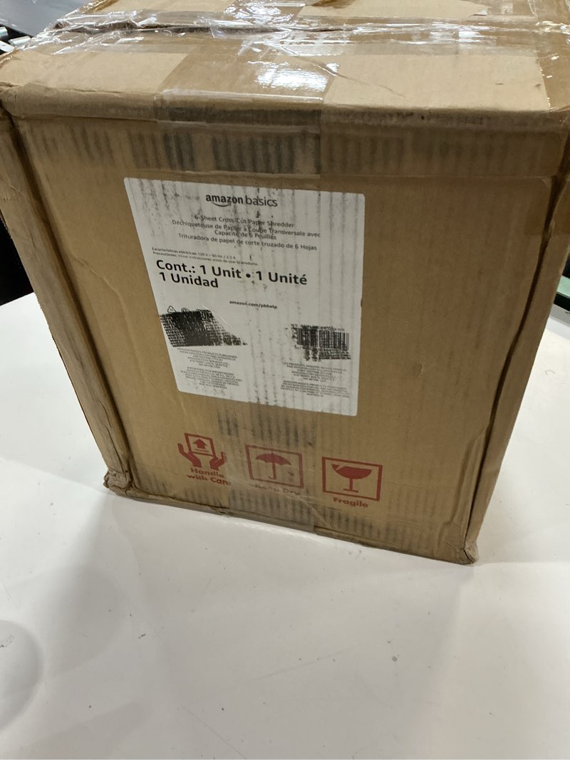 Condition photo showing As Is for Amazon Basics 6-Sheet Cross-Cut Paper and Credit Card Shredder with 3.8 Gallon Bin, Shreds Staples, Black