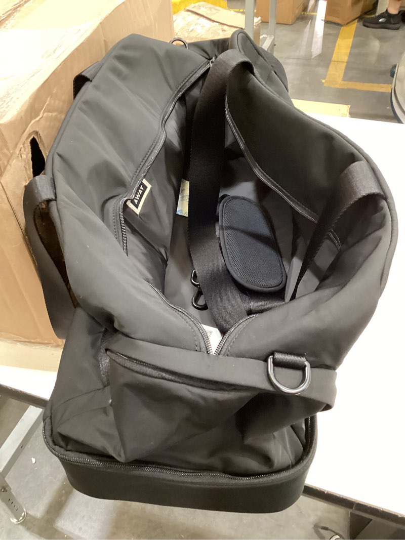 Condition photo showing Good Condition for away featherlight weekender bag - airline approved carry on bag with 16" laptop pocket, shoe compartment, interior and exterior pockets - travel duffle bag - jet black