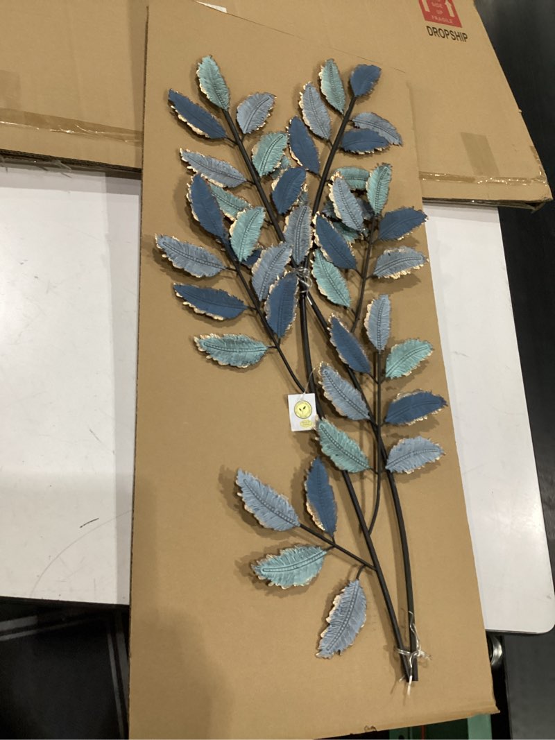 Condition photo showing New/Like New for deco 79 traditional metal leaves wall decor, 15" x 1" x 32", blue