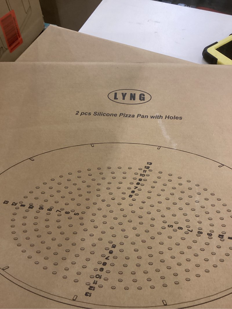 Condition photo showing Good Condition for 2 Pc silicone pizza pan with holes