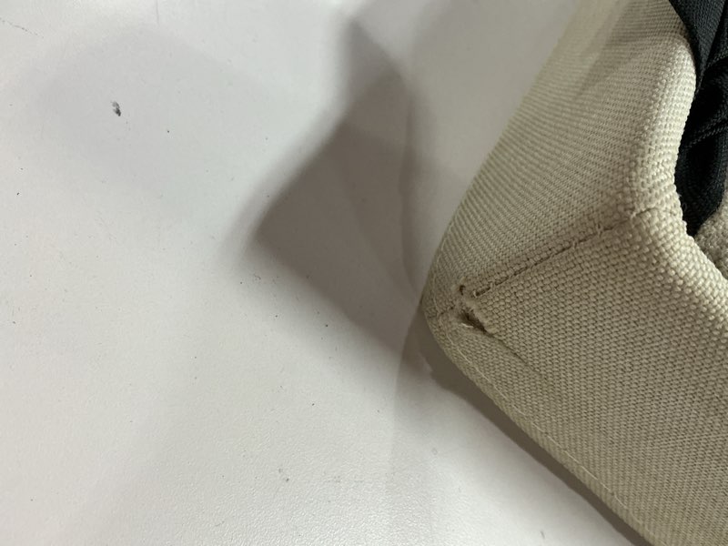 Condition photo showing As Is for SONGMICS MAZIE Collection - 30 Inches Folding Storage Ottoman Bench, Ottoman Foot Rest, End of Bed Bench, Storage Chest, Load 660 lb, for Living Room, Bedroom, Entryway, Cream White ULSF47BE Cream White 15"D x 30"W x 15"H