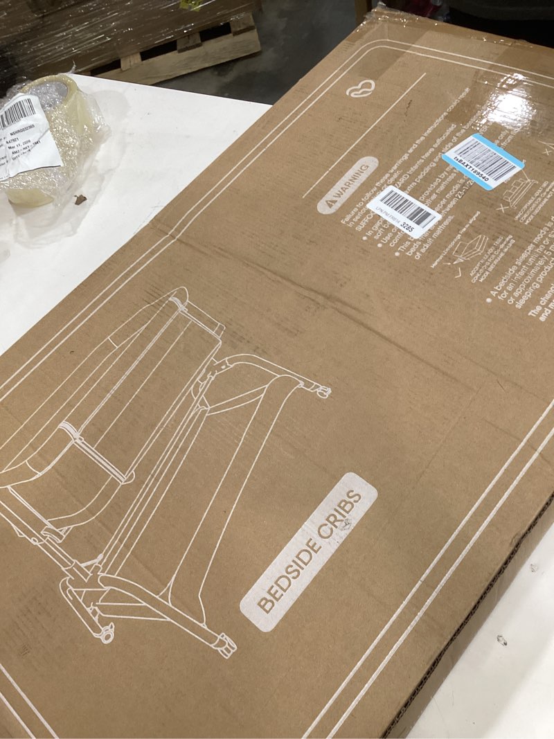 Condition photo showing Good Condition for Baby Bassinet Bedside Crib, 3-in-1 Baby Bassinet Bedside Sleeper with Mattress and Soft, Breathable Sheet, Full-Mesh Sides, 6-Height Adjustable, Stable and Secure Crib for Newborns Wood Grain Legs + Beige Bed