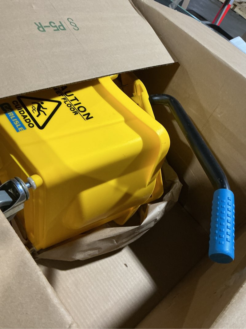 Condition photo showing As Is for Carlisle FoodService Products 26-Quart Commercial Mop Bucket with Side-Press Wringer, Precision-Molded Polypropylene, Durable Wringer, Bucket with Non-Marking Casters, 18.5 x 16.5 x 23 Inches, Yellow