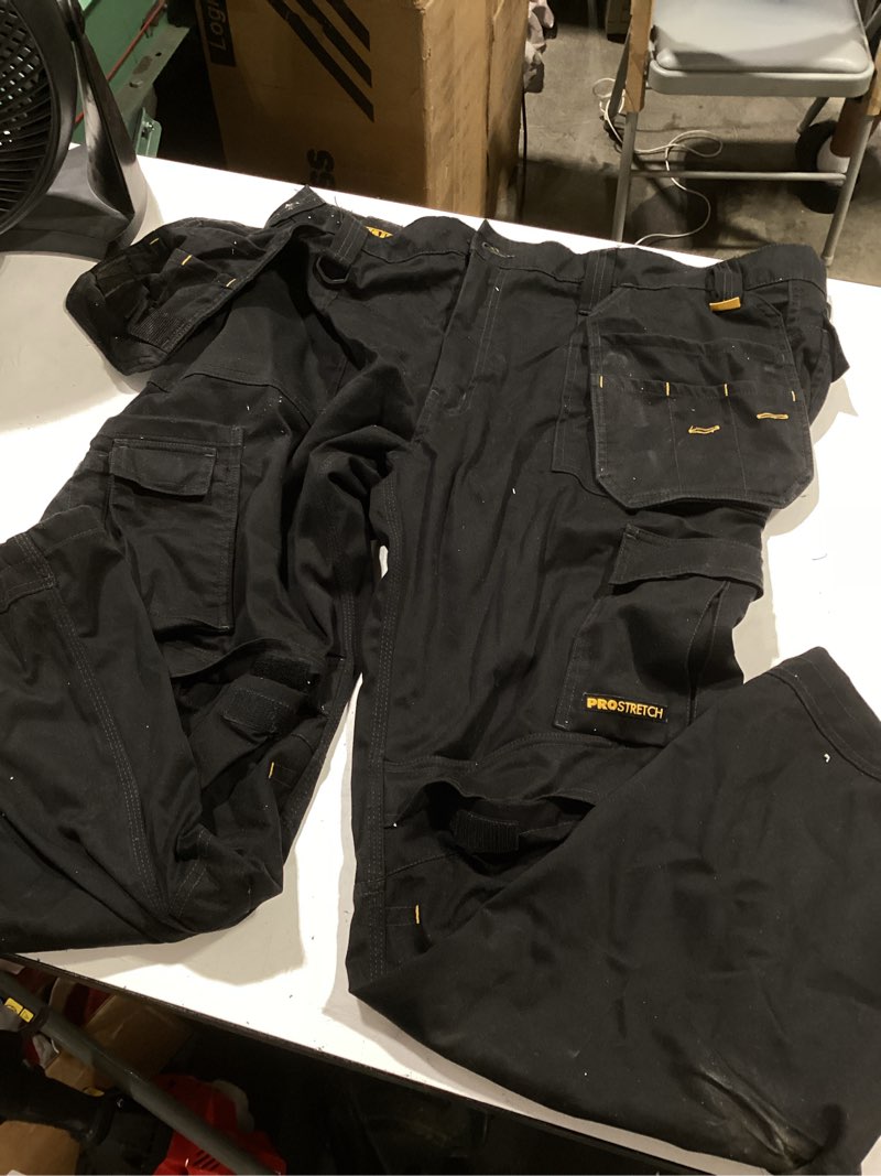 Condition photo showing As Is for dewalt pro tradesman men's black work pants ( 42 x 33 )