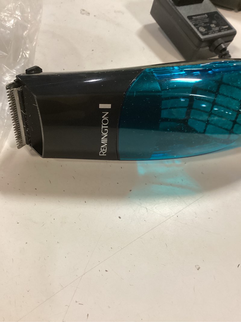 Condition photo showing As Is for Remington Vacuum Haircut Kit, Vacuum Beard Trimmer, Hair Clippers for Men with Removable Hair Chamber and Dual Motor Power (18 pieces) 18 Piece Set