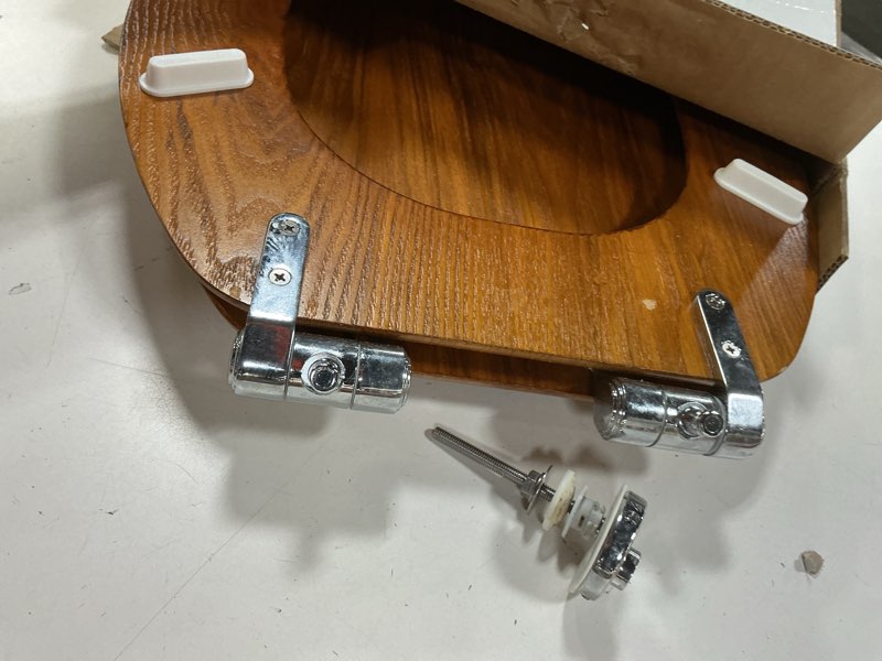 Condition photo showing As Is for Angel Shield Wood Toilet Seat Elongated with Soft Close,Easy Clean,Quick-Release Hinges(Elongated,Wood) Elongated-18.5" Wood