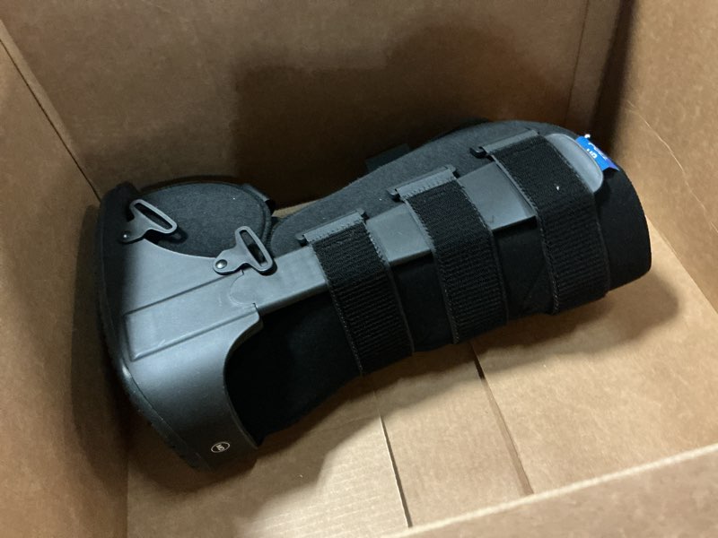 Condition photo showing As Is for united ortho cam walker fracture boot, medium, black black medium