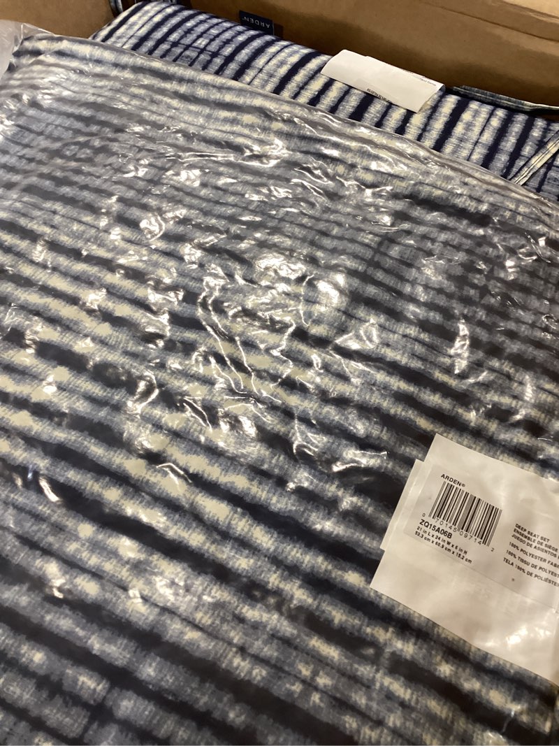 Condition photo showing Good Condition for arden outdoor deep seat cushion set, 24 in x 24 in, weather-proof, rain-proof, fade resistant patio cushion for chair, sofa, and couch blue shibori stripe polyfill blue shibori stripe 1 pack