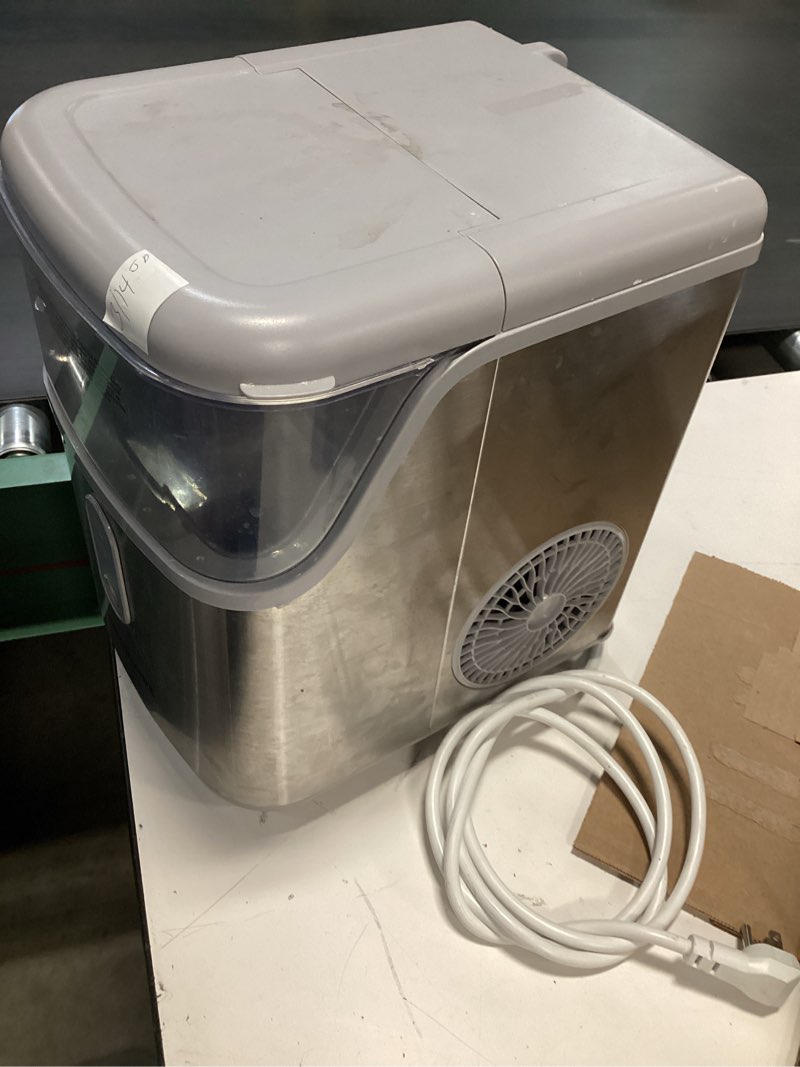 Condition photo showing As Is for frigidaire gray ice maker machine heavy duty