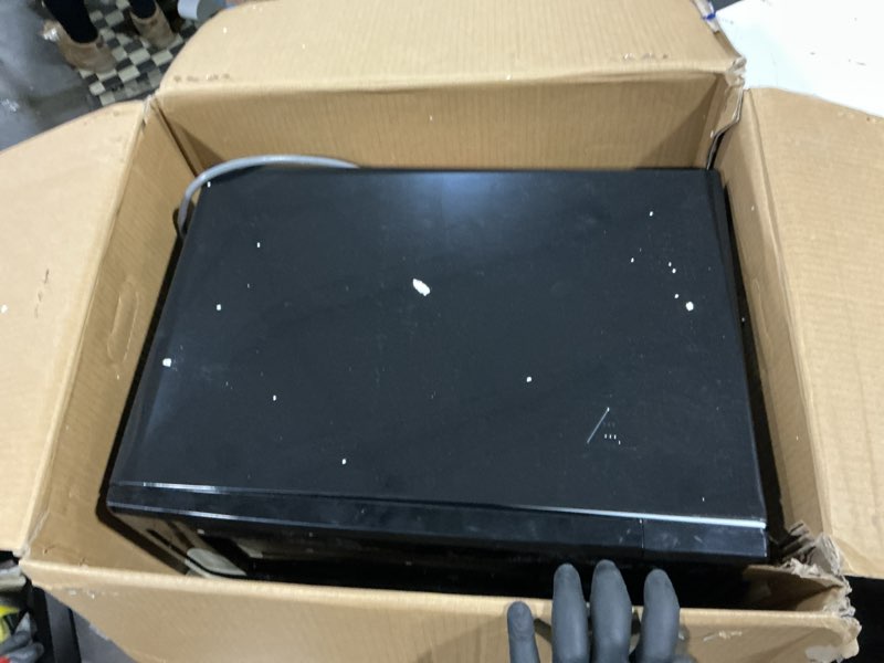 Condition photo showing As Is for ge gcst14s1wbb 1.4 cu. ft. black countertop microwave 1.4 cu.ft. black