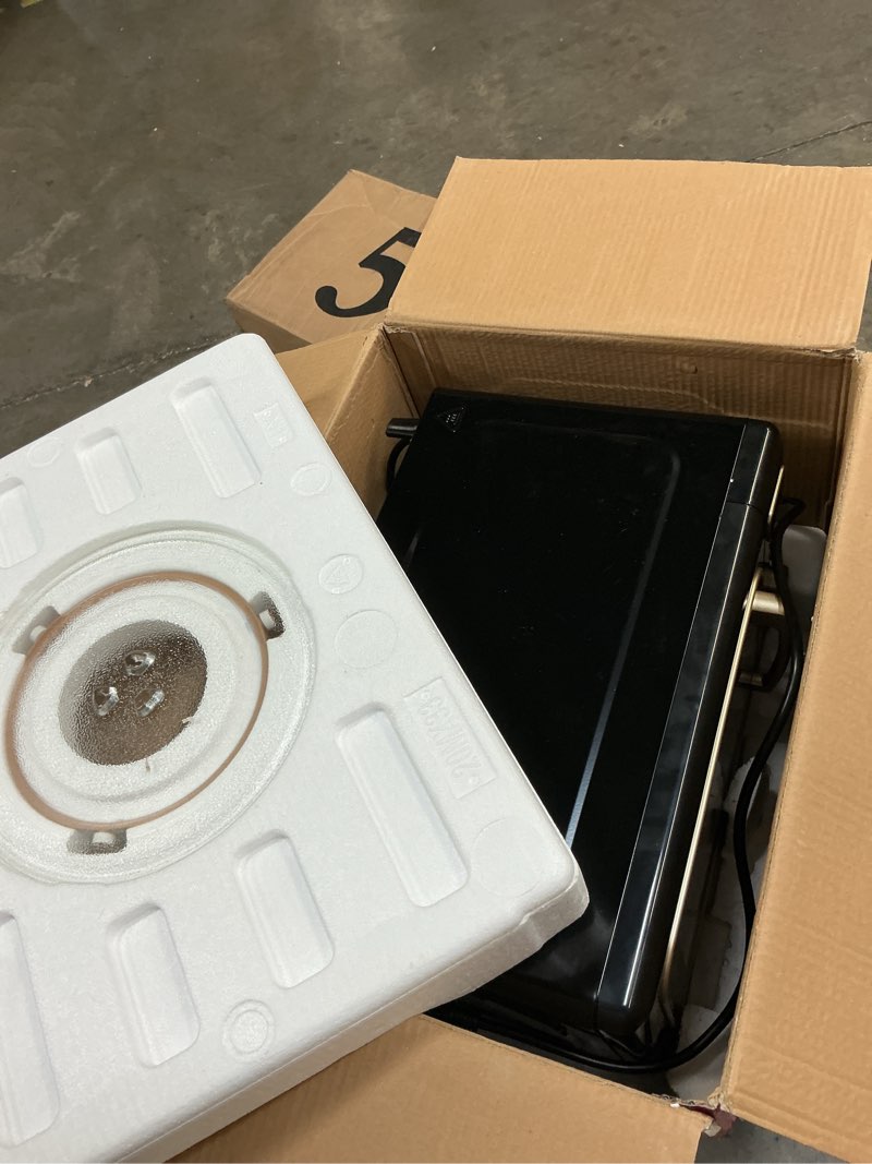 Condition photo showing item condition for FRIGIDAIRE EMW788RETRO 0.7 cu. ft. Retro Microwave, Black-Gold Retro Black