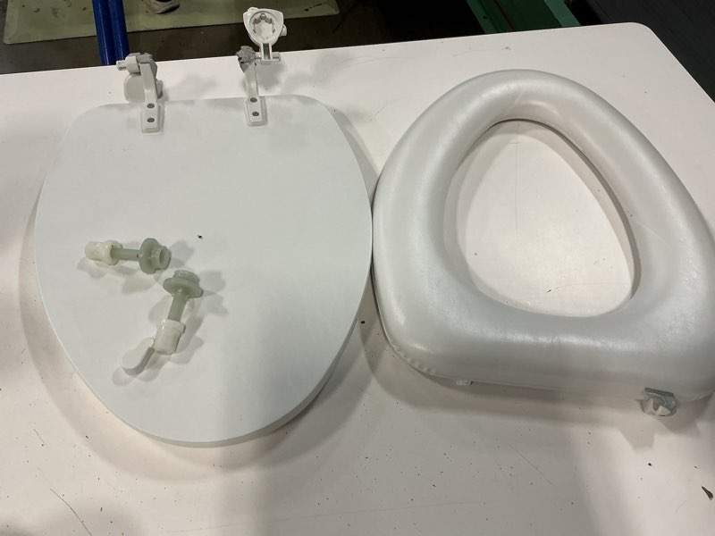 Condition photo showing As Is for (defective , its a broken ) project source plastic white elongated soft close toilet seatc