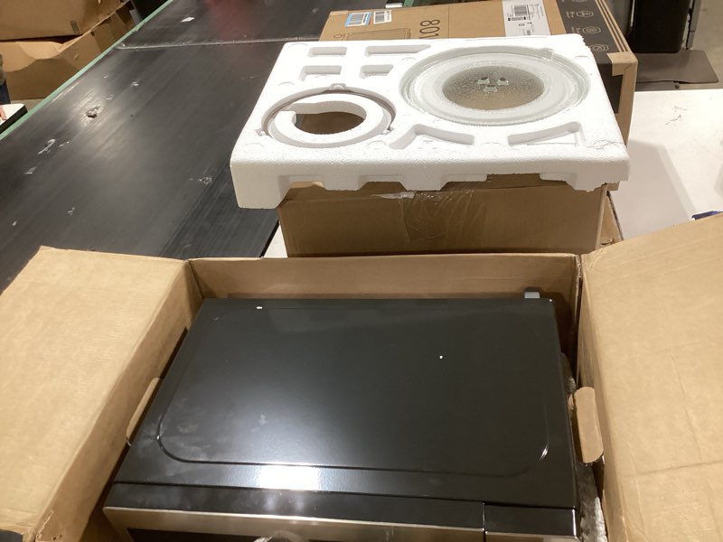 Condition photo showing Good Condition for ge - 0.7 cu. ft. countertop microwave with convenience cooking control - black stainless steel