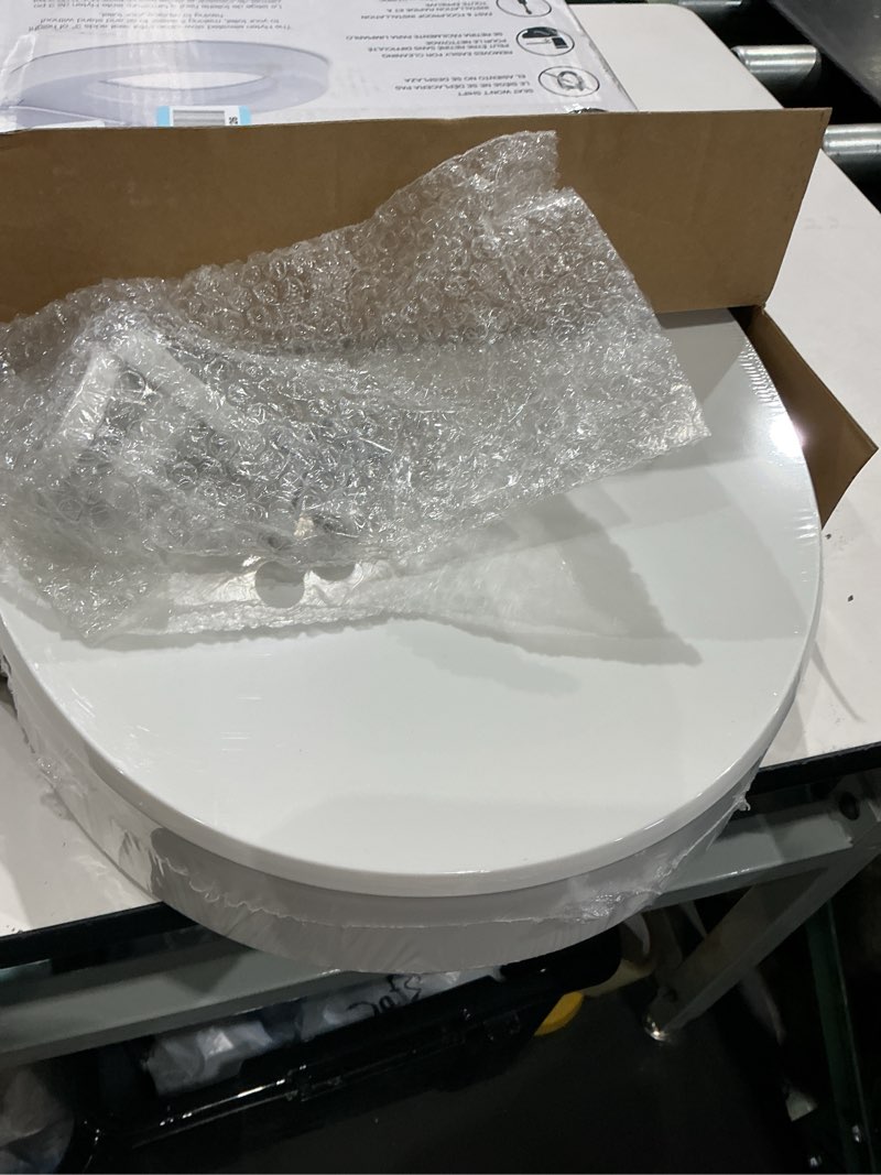 Condition photo showing Good Condition for kohler 25876-0 hyten 3" height, elevated soft close round toilet seat, contoured seat with grip-tight bumpers, quick-attach hardware, white white round