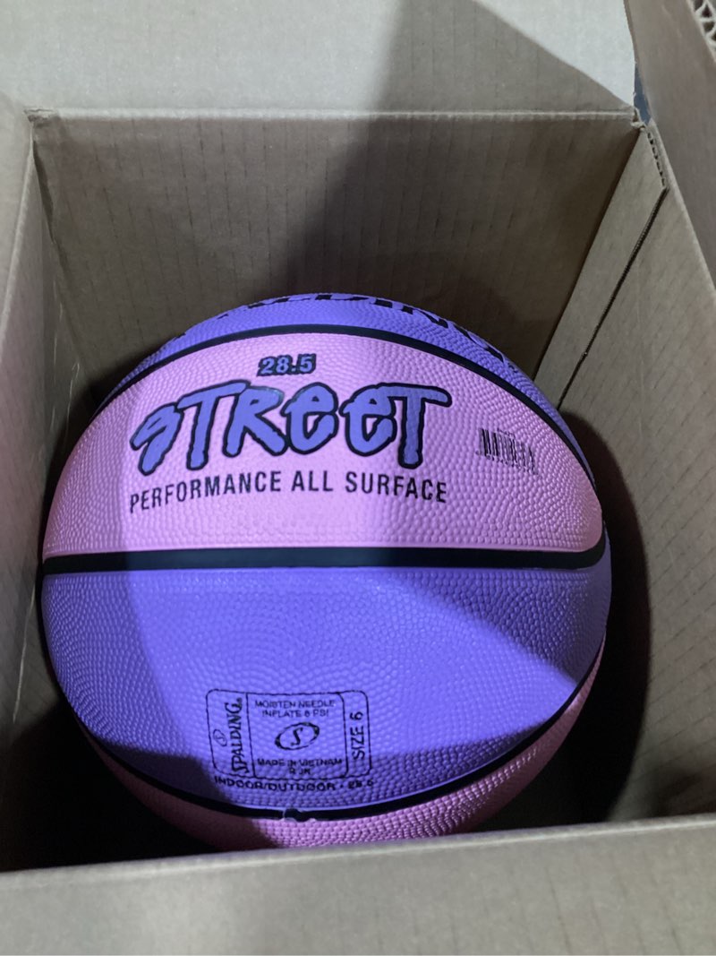 Condition photo showing New/Like New for spalding outdoor rubber basketballs | performance rubber cover designed for outdoor play | multiple sizes & colors size 6, 28.5" street - pink/purple