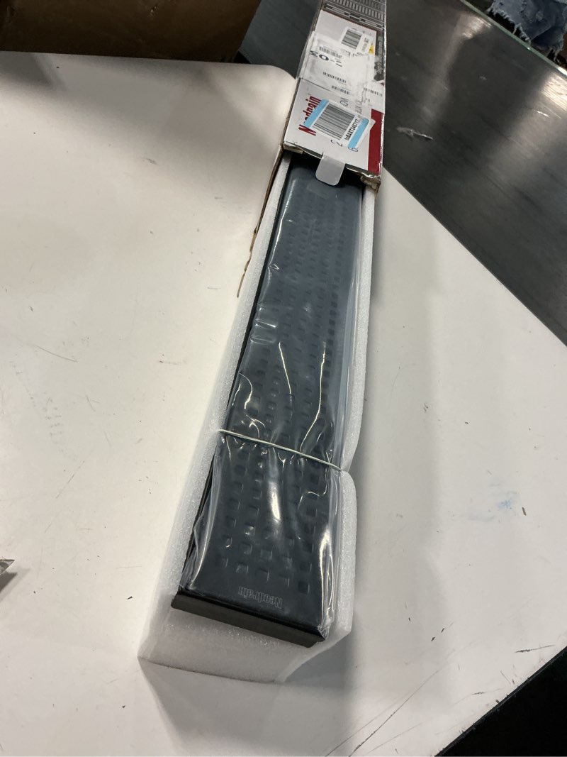Condition photo showing Good Condition for neodrain 24-inch black linear shower drain with removable quadrato pattern grate, 304 stainless steel rectangle shower floor drain, linear drain with leveling feet, hair strainer, matte black matte black 24 in