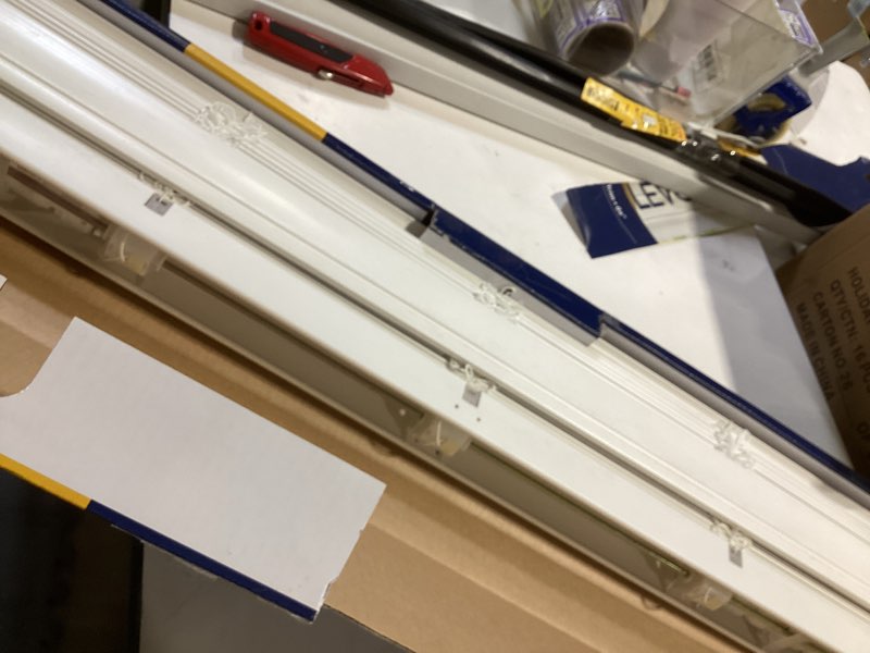 Condition photo showing As Is for LEVOLOR Trim+Go 2-in Slat Width 51-in x 64-in Cordless White Faux Wood
