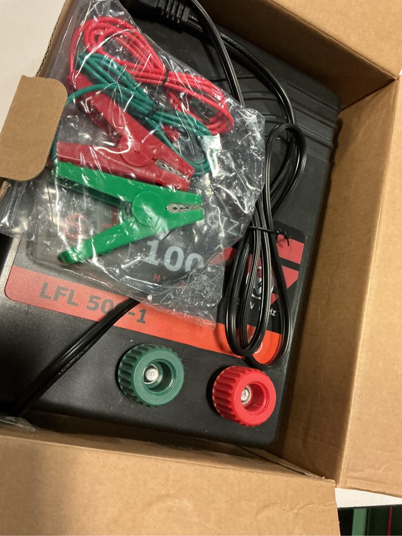 Condition photo showing Good Condition for electric fence charger ac powered 100 miles 300 acres, 110 volt 6.7 joule plug-in electric fence energizer, output voltage max 10.2 kv for livestock, preventing predators from intruding
