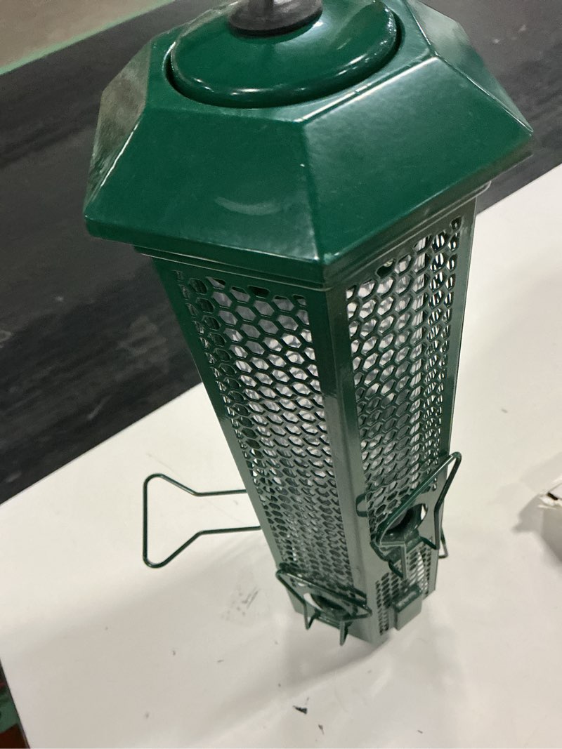 Condition photo showing As Is for green metal hanging mount squirrel proof wild bird seed feeder with 6-weight-activated ports perches for birds 3 lbs.