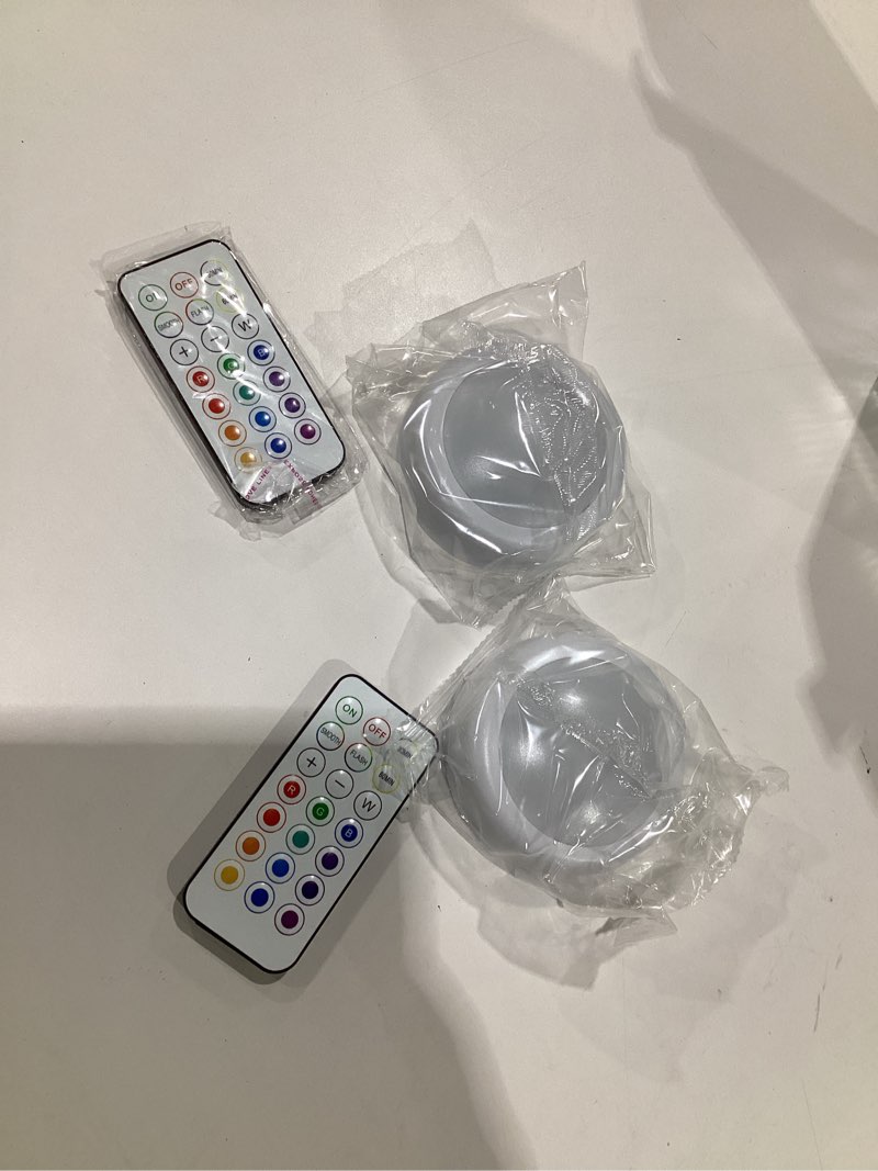 Condition photo showing Good Condition for BLS LED Puck Lights with Remote Control, Wireless Under Cabinet & Closet Lighting, RGB 13 Color Changing Lights with Dimmer, Timer & AA Battery Operated, Push, Touch, Stick on for Night, Wall, 6 Pack RGB -6 Pack(White Shell)
