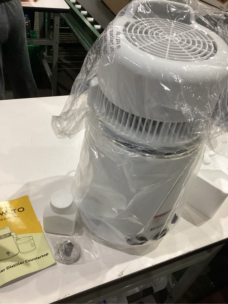 Condition photo showing Good Condition for vivohome water distiller countertop 1.6 gallon/6l 900w distilled water machine with smart switch purifier filter for home office, white white 1.6 gallon