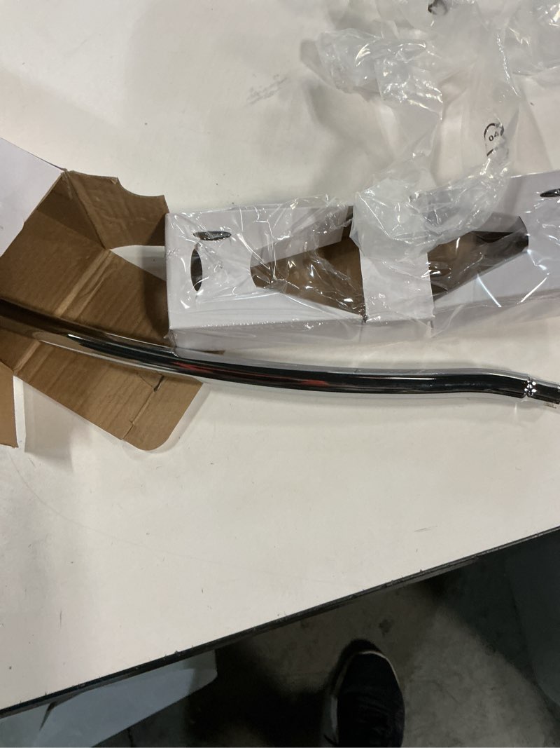 Condition photo showing As Is for DELTA FAUCET 79718 Cassidy 18-in Wall Mount Towel Bar Bath Hardware Accessory in Polished Chrome Polished Chrome 18 inch Single