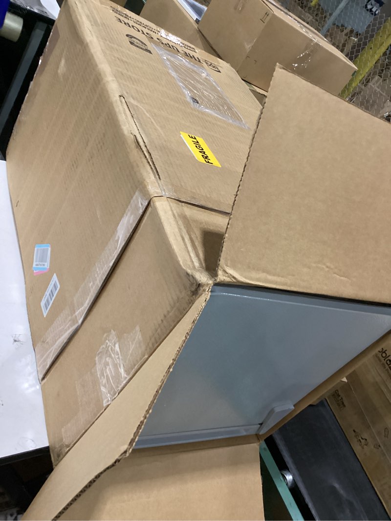 Condition photo showing Good Condition for frigidaire retro compact fridge with chiller, 3.2 cu ft countertop fridge with built-in bottle opener, compact refrigerator for office, bedroom, dorm room or cabin - 16.5"d x 19"w x 31"h (moonbeam)